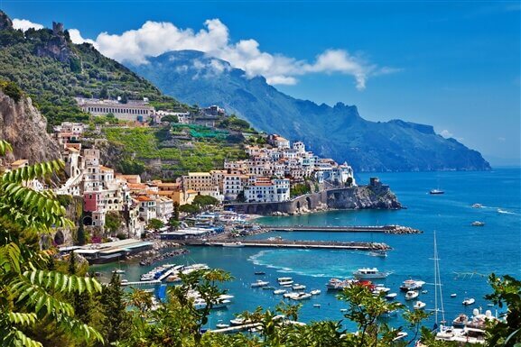 Morning view of Amalfi cityscape on coast line of mediterranean sea, Italy